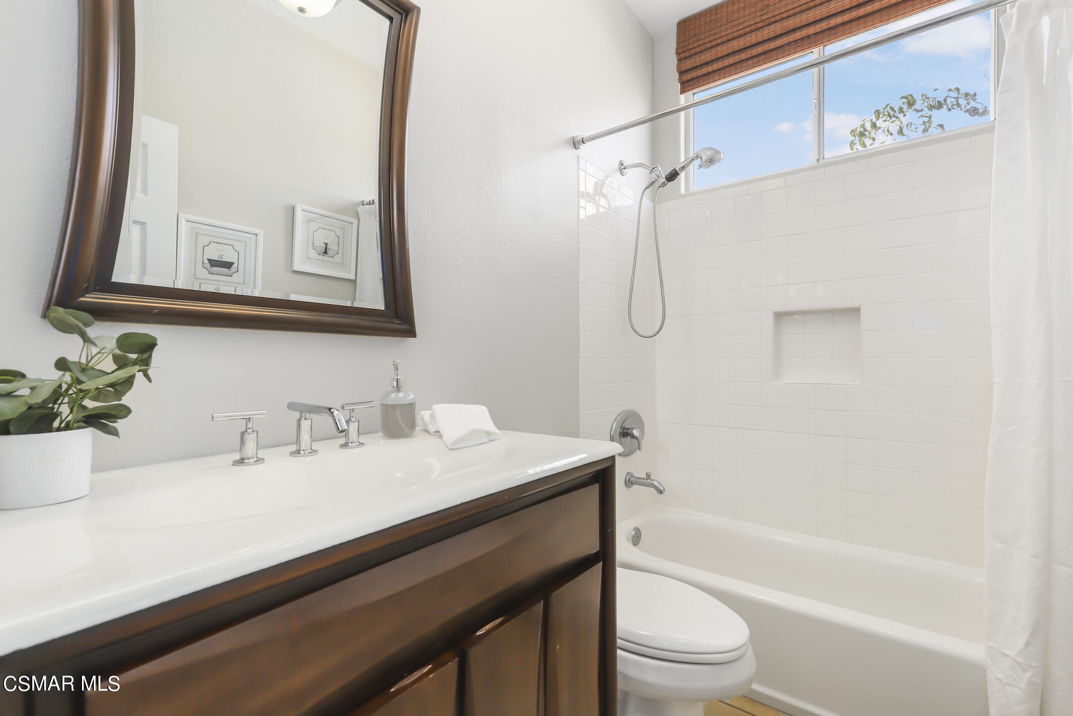 4006 Brindisi Place Moorpark, CA 93021 - Photo 22 of 32 a bathroom with a sink a toilet and shower