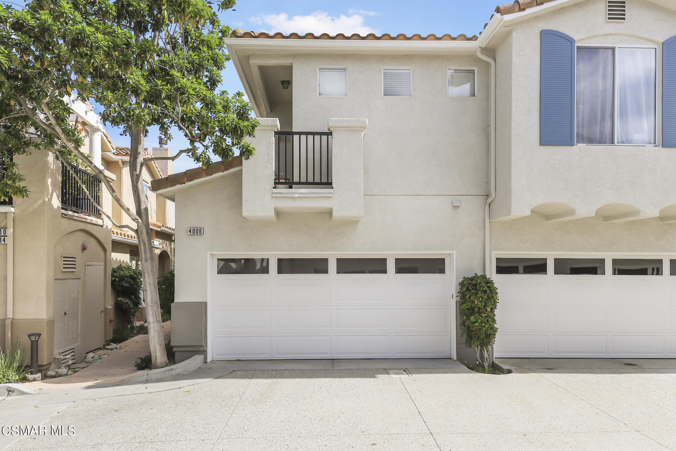 4006 Brindisi Place Moorpark, CA 93021 - Photo 30 of 32 a view of a house with a tree
