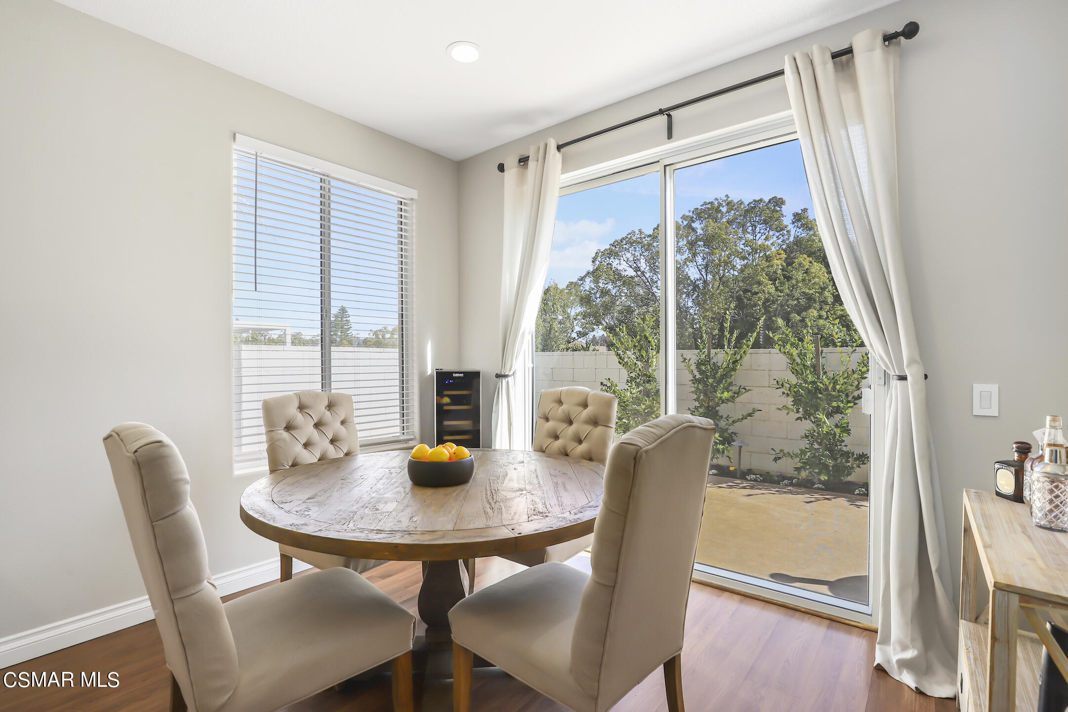 4006 Brindisi Place Moorpark, CA 93021 - Photo 10 of 32 a view of a dining room with furniture and window