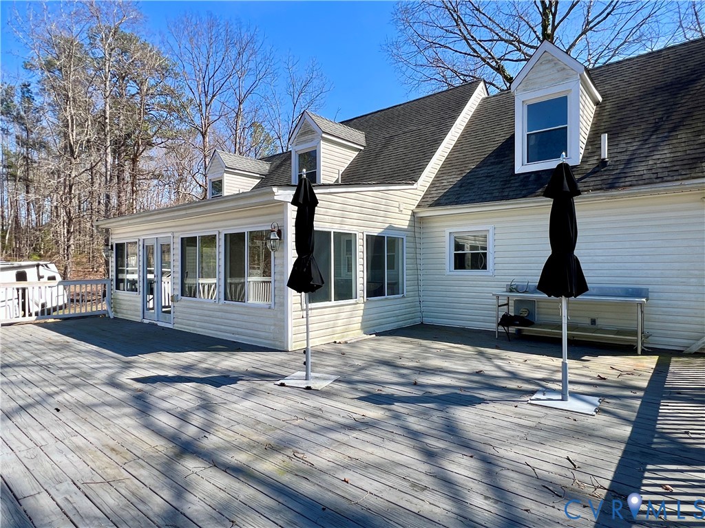 2049 Riddle Road Blackstone, VA 23824 - Photo 2 of 44 Wooden deck with a sunroom