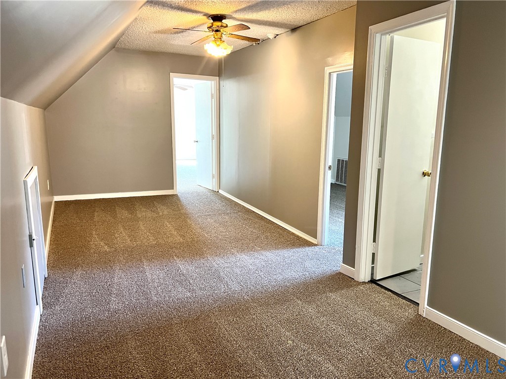 2049 Riddle Road Blackstone, VA 23824 - Photo 22 of 44 Bonus room with a ceiling fan and carpet flooring