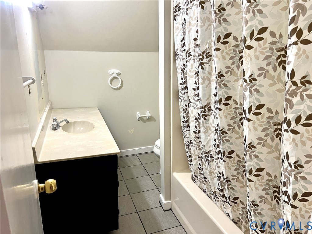 2049 Riddle Road Blackstone, VA 23824 - Photo 23 of 44 Bathroom with vanity, light tile patterned floors,