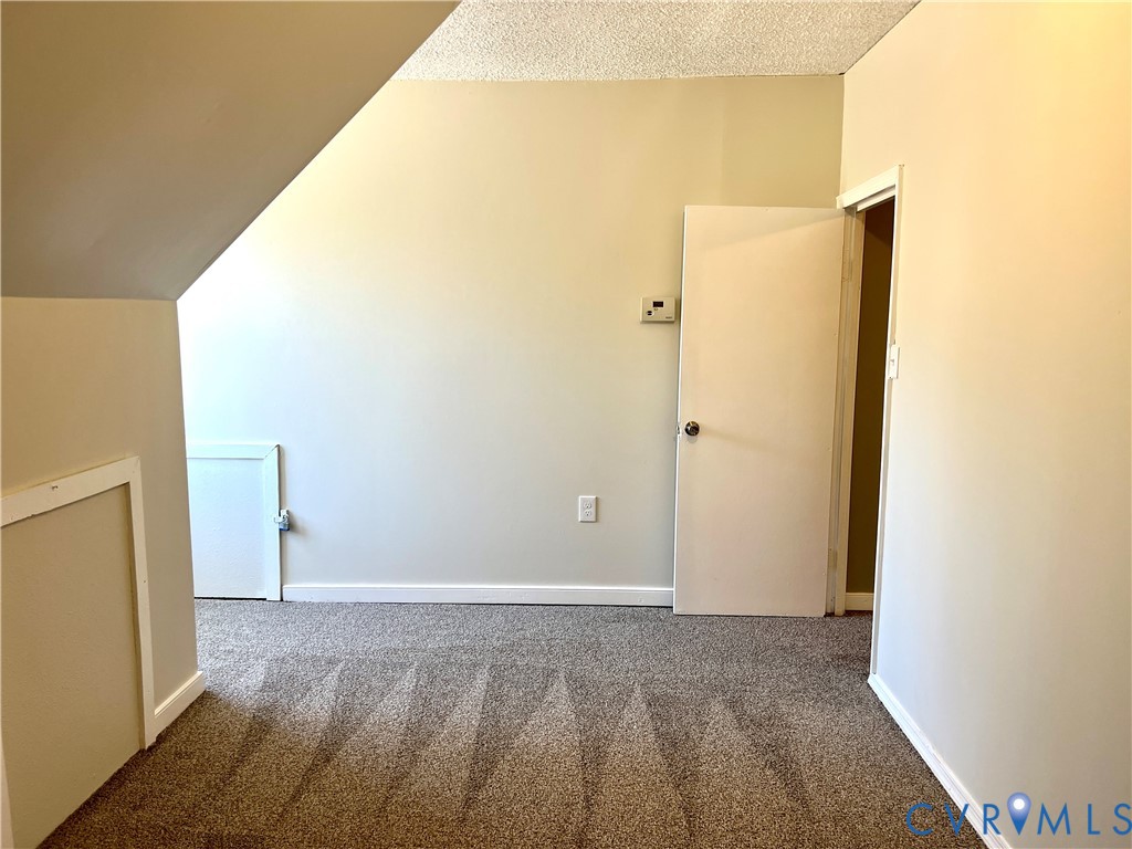2049 Riddle Road Blackstone, VA 23824 - Photo 25 of 44 Additional living space with carpet flooring and b