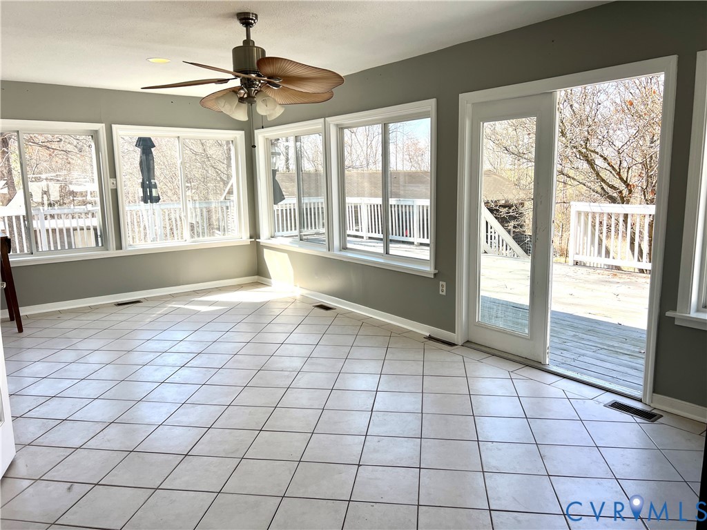 2049 Riddle Road Blackstone, VA 23824 - Photo 32 of 44 Unfurnished sunroom featuring tile patterned floor