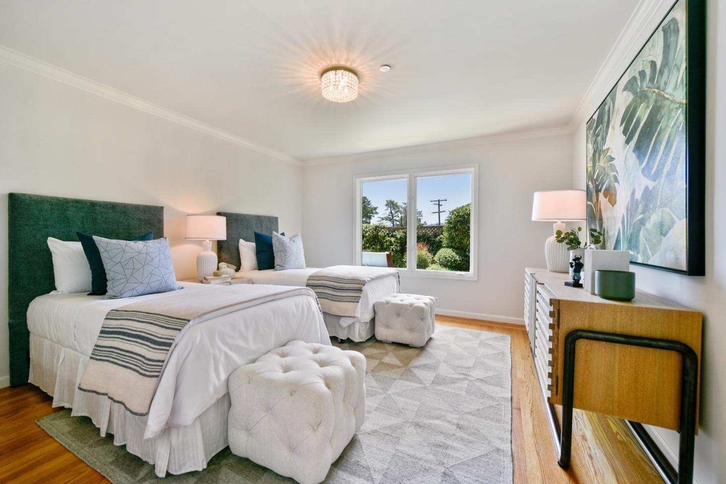 855 Longview Road Hillsborough, CA 94010 - Photo 14 of 32 a bedroom with a large bed and a couch