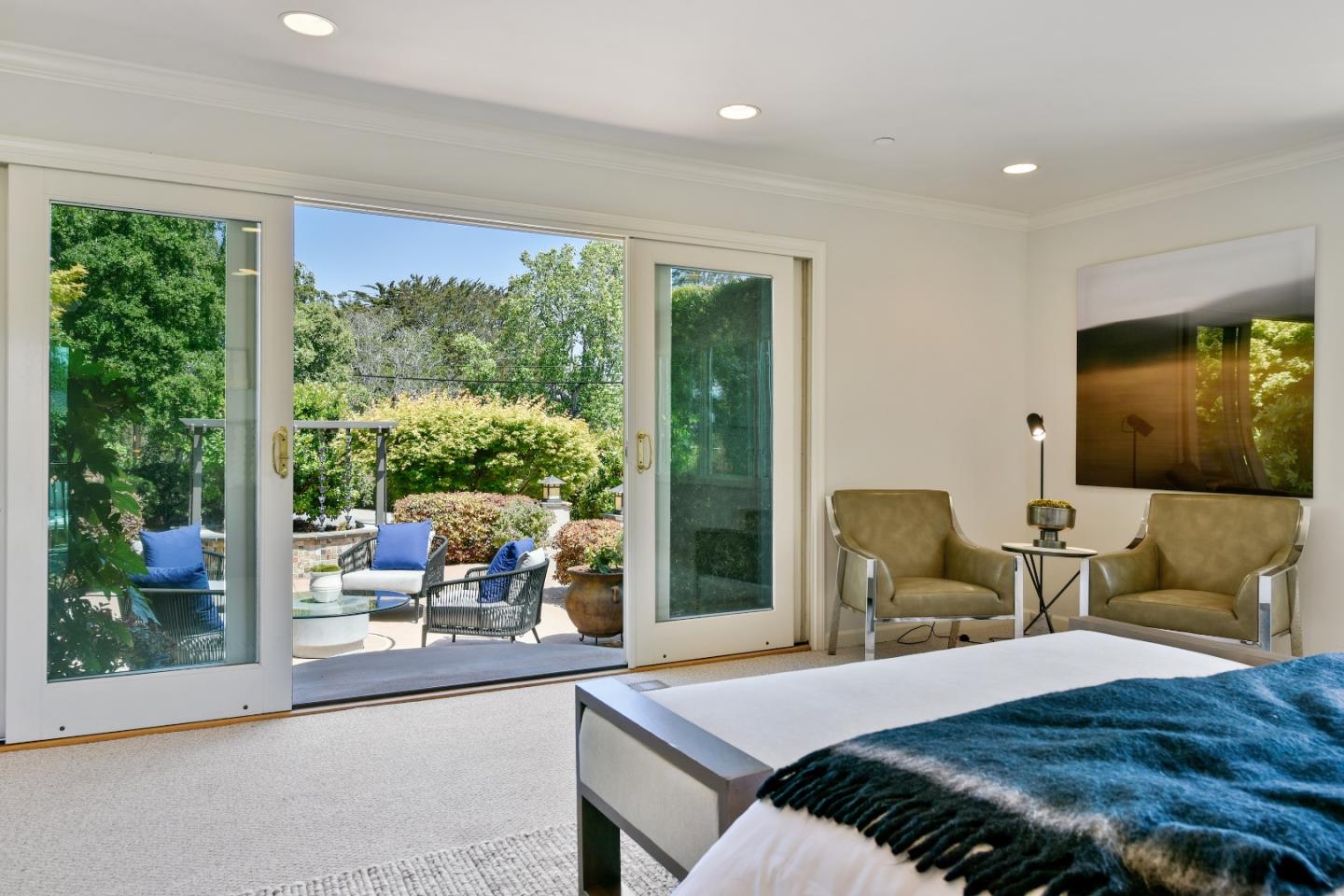 855 Longview Road Hillsborough, CA 94010 - Photo 17 of 32 a bedroom with furniture and large windows