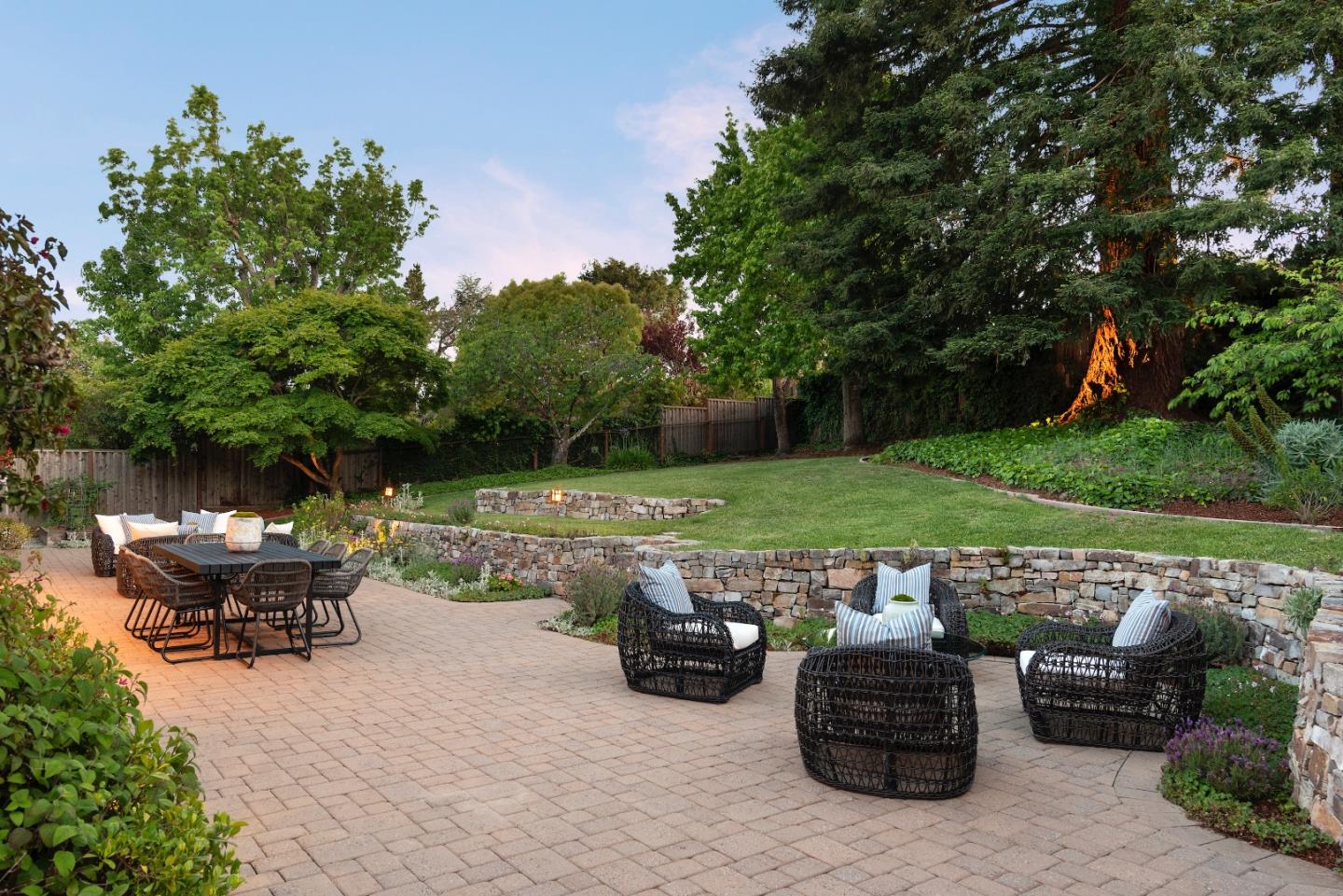 855 Longview Road Hillsborough, CA 94010 - Photo 21 of 32 a view of patio with table and chairs potted plants and a large tree