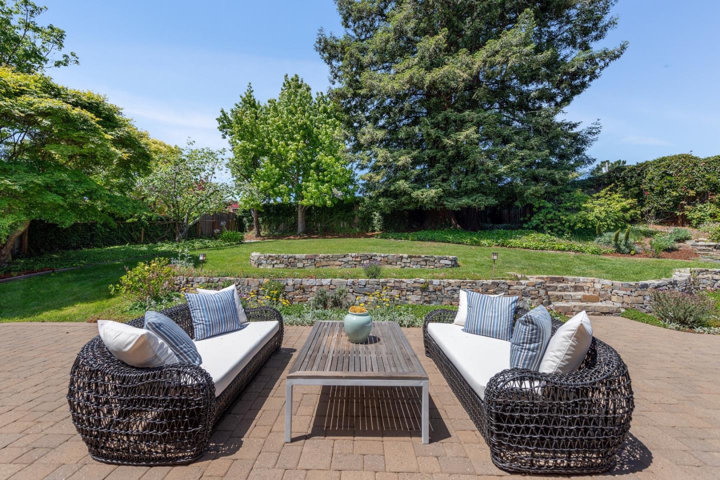 855 Longview Road Hillsborough, CA 94010 - Photo 22 of 32 a view of patio filled with furniture and yard