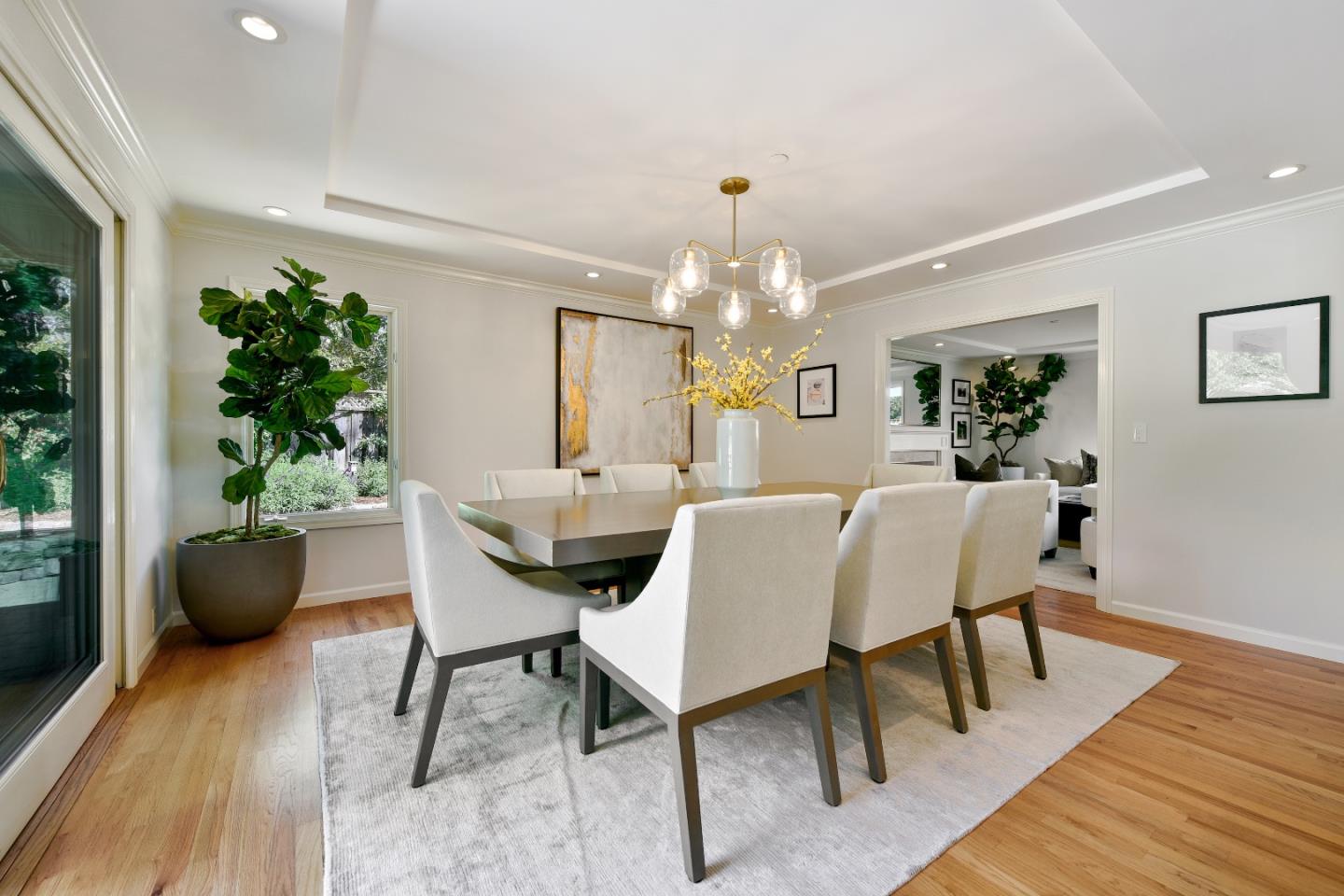 855 Longview Road Hillsborough, CA 94010 - Photo 7 of 32 a view of a dining room with furniture and wooden floor