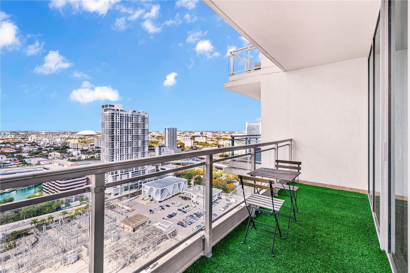 92 Southwest 3rd Street, Unit 3108 Miami, FL 33130 - Photo 19 of 19 a view of a balcony with chairs