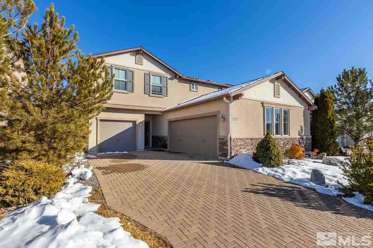 9150 Sunrock Road Reno, NV 89521 - Photo 2 of 19 a front view of a house with a yard