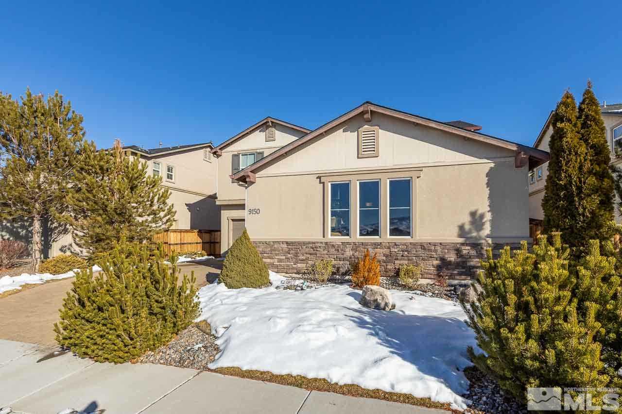 9150 Sunrock Road Reno, NV 89521 - Photo 3 of 19 a front view of a house with a yard