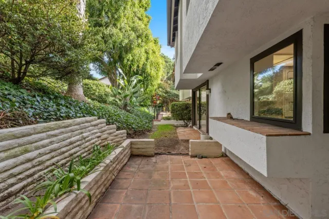 a front view of a house with a garage