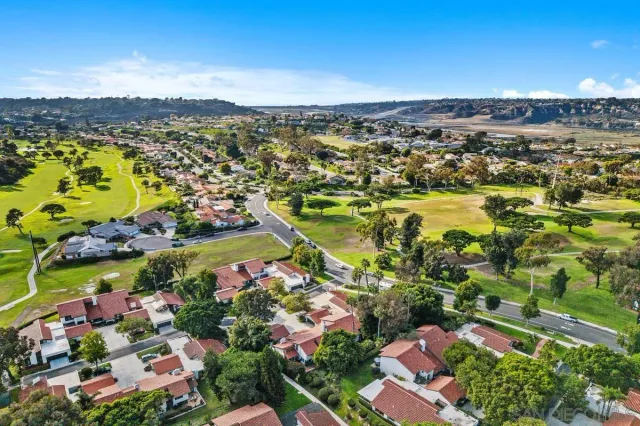an aerial view of a house with a garden