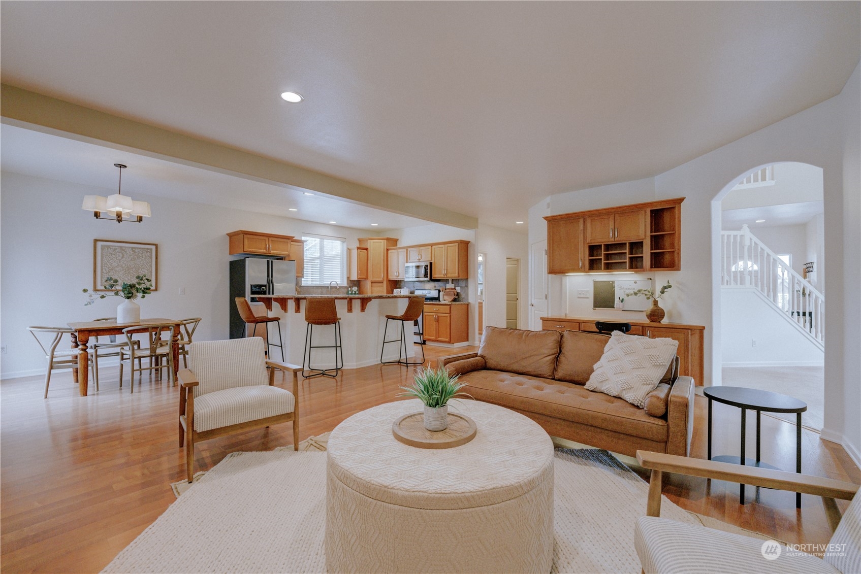 2115 241st Street Southwest Bothell, WA 98021 - Photo 14 of 40 a living room with furniture and a wooden floor
