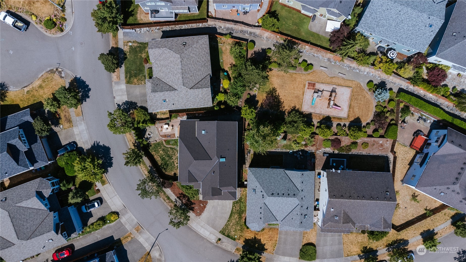 2115 241st Street Southwest Bothell, WA 98021 - Photo 2 of 40 an aerial view of a house with a yard potted plants and large tree