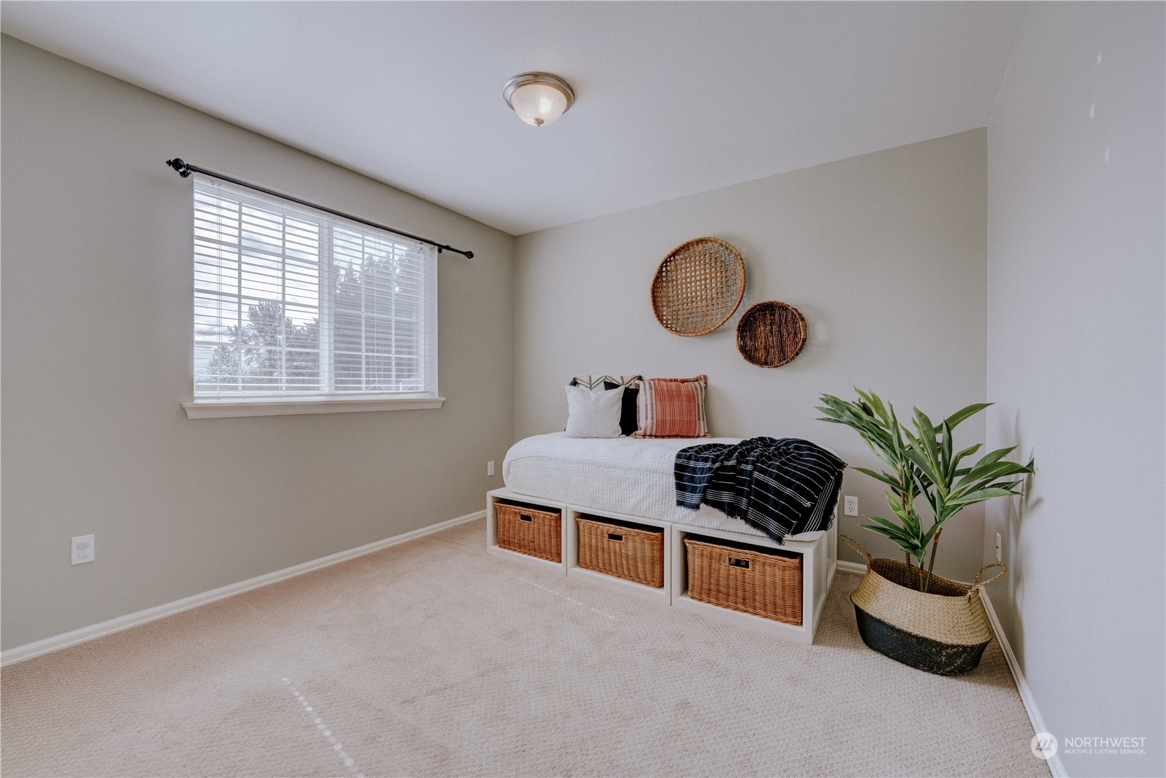 2115 241st Street Southwest Bothell, WA 98021 - Photo 32 of 40 a living room with furniture and a potted plant