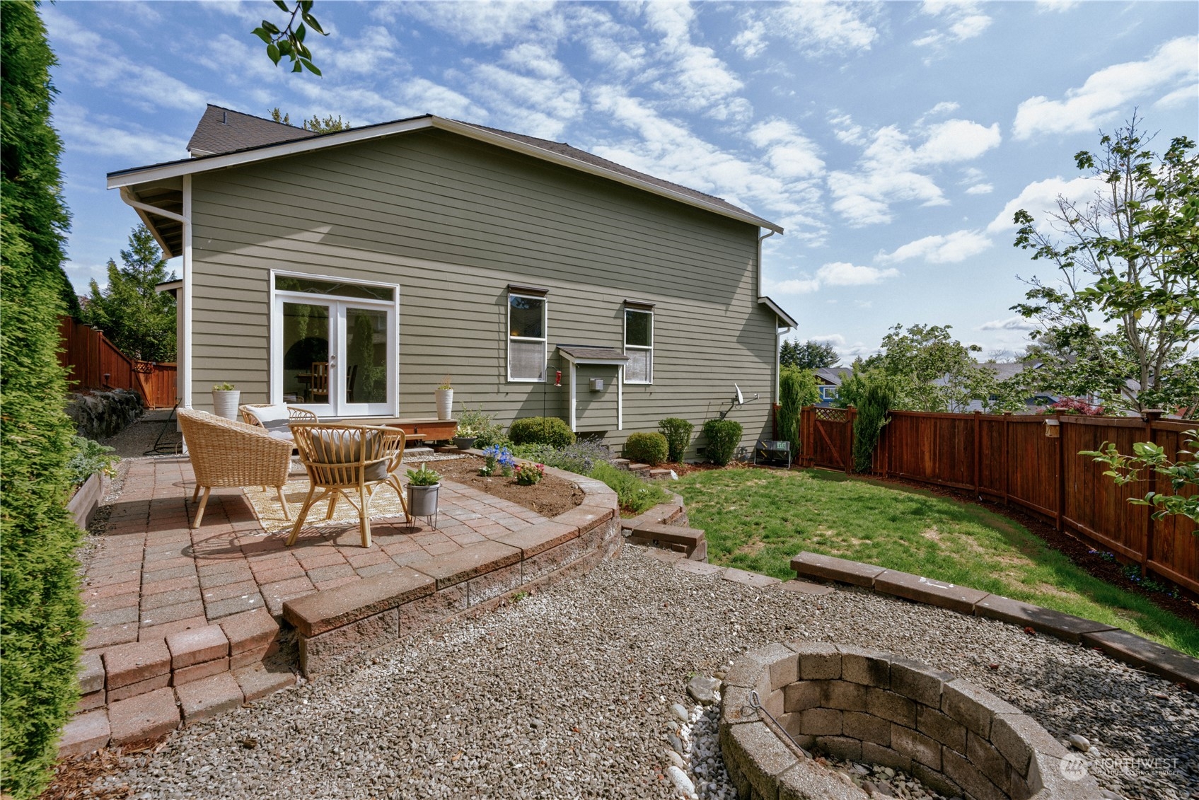 2115 241st Street Southwest Bothell, WA 98021 - Photo 34 of 40 a view of backyard with outdoor seating and green space