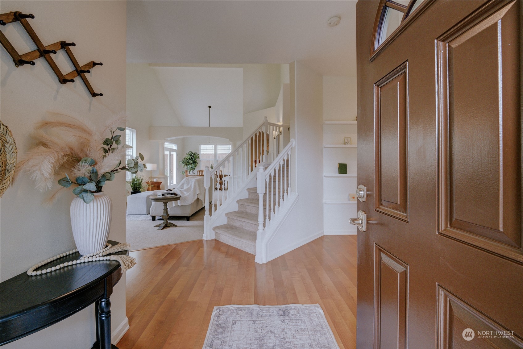 2115 241st Street Southwest Bothell, WA 98021 - Photo 4 of 40 a living room with furniture and a wooden floor