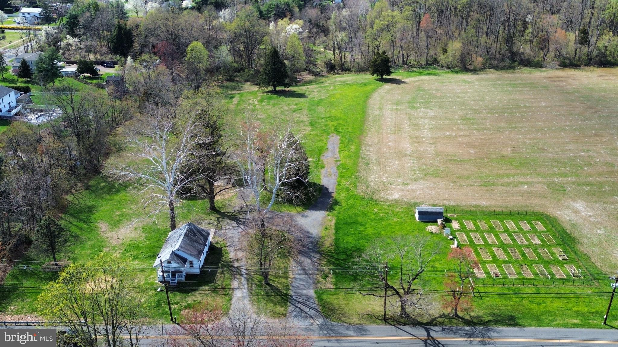 4371 Crosswicks Hamilton Square Road Hamilton, NJ 08691 - Photo 1 of 13 a backyard of a house with lots of green space