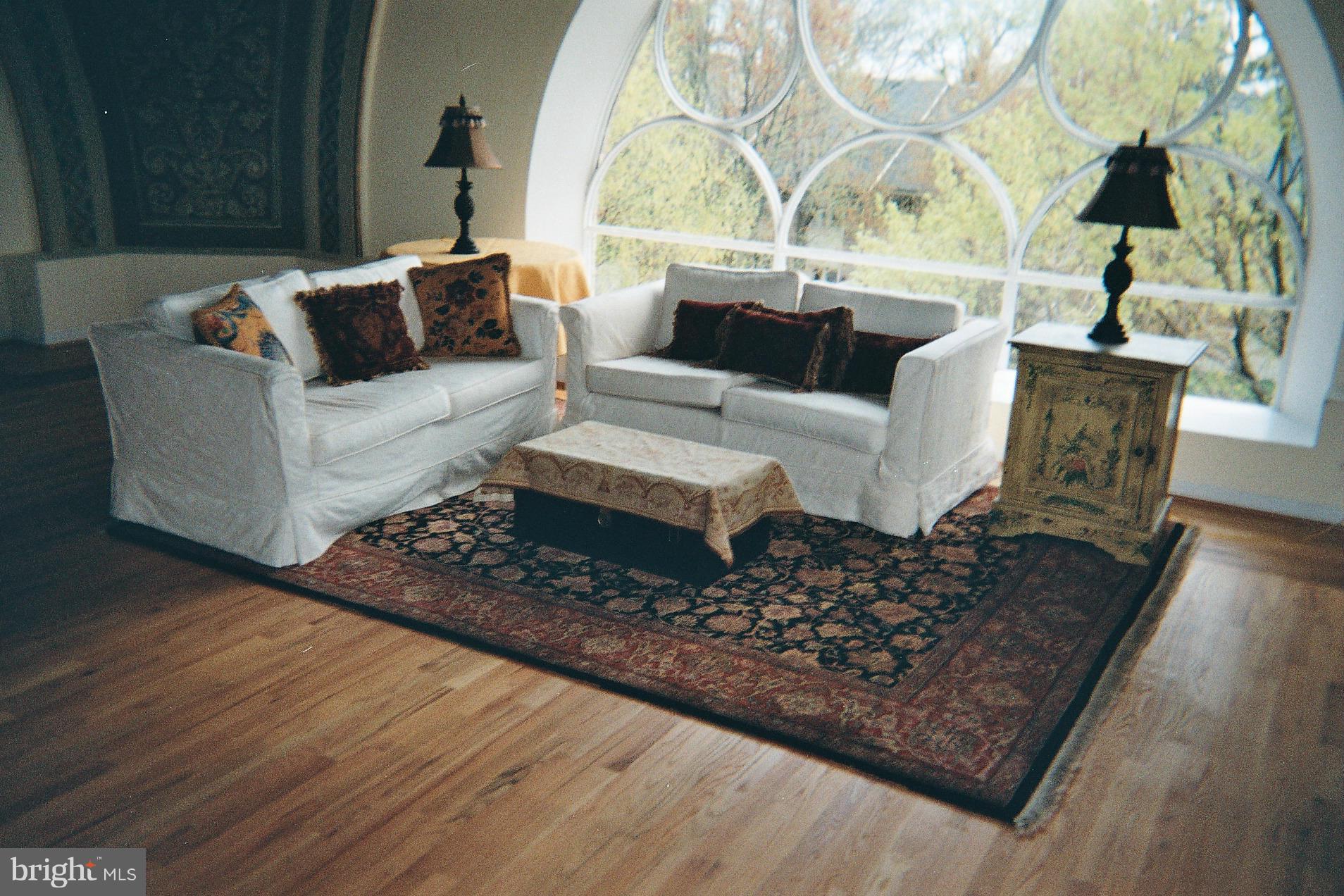 5712 Roland Avenue, Unit 3C Baltimore, MD 21210 - Photo 3 of 17 Living Room with LARGE sitting areas1