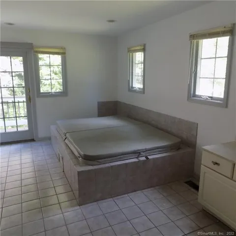 an empty room with windows