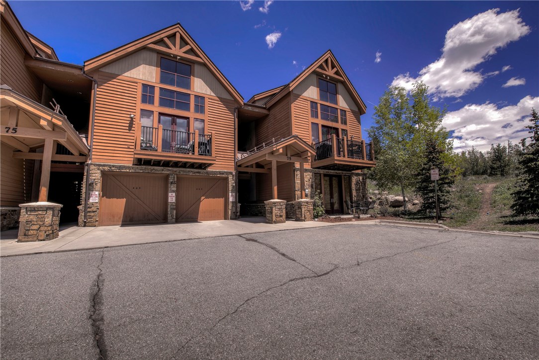 75 Antler Gulch Road, Unit 405 Keystone, CO 80435 - Photo 26 of 30 End unit with open space on side and back. One car garage is to the left of this end unit.