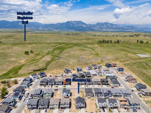 a view of a city with an ocean