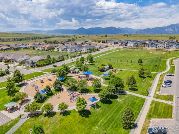 a view of a city with mountains in the background