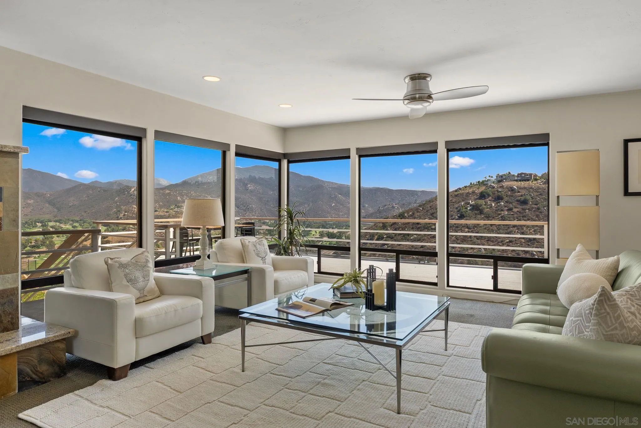 2552 Singing Vista Way El Cajon, CA 92019 - Photo 13 of 34 a living room with furniture and large windows
