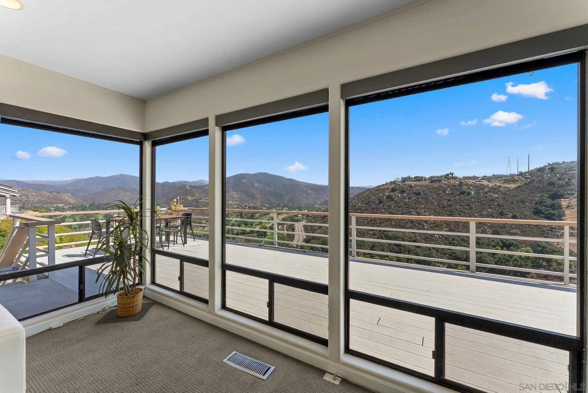 2552 Singing Vista Way El Cajon, CA 92019 - Photo 14 of 34 a view of a city from a balcony