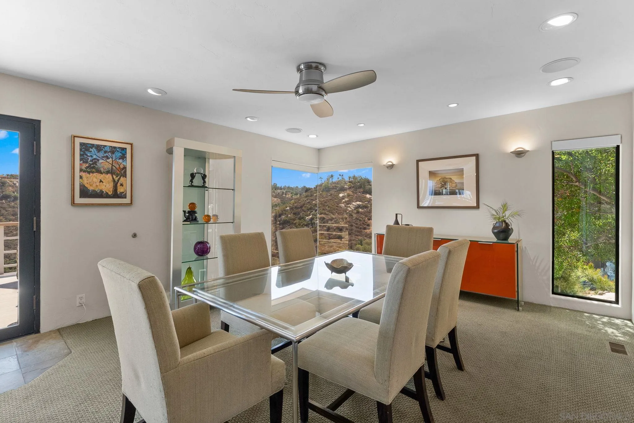 2552 Singing Vista Way El Cajon, CA 92019 - Photo 16 of 34 a dining room with furniture a window and a chandelier