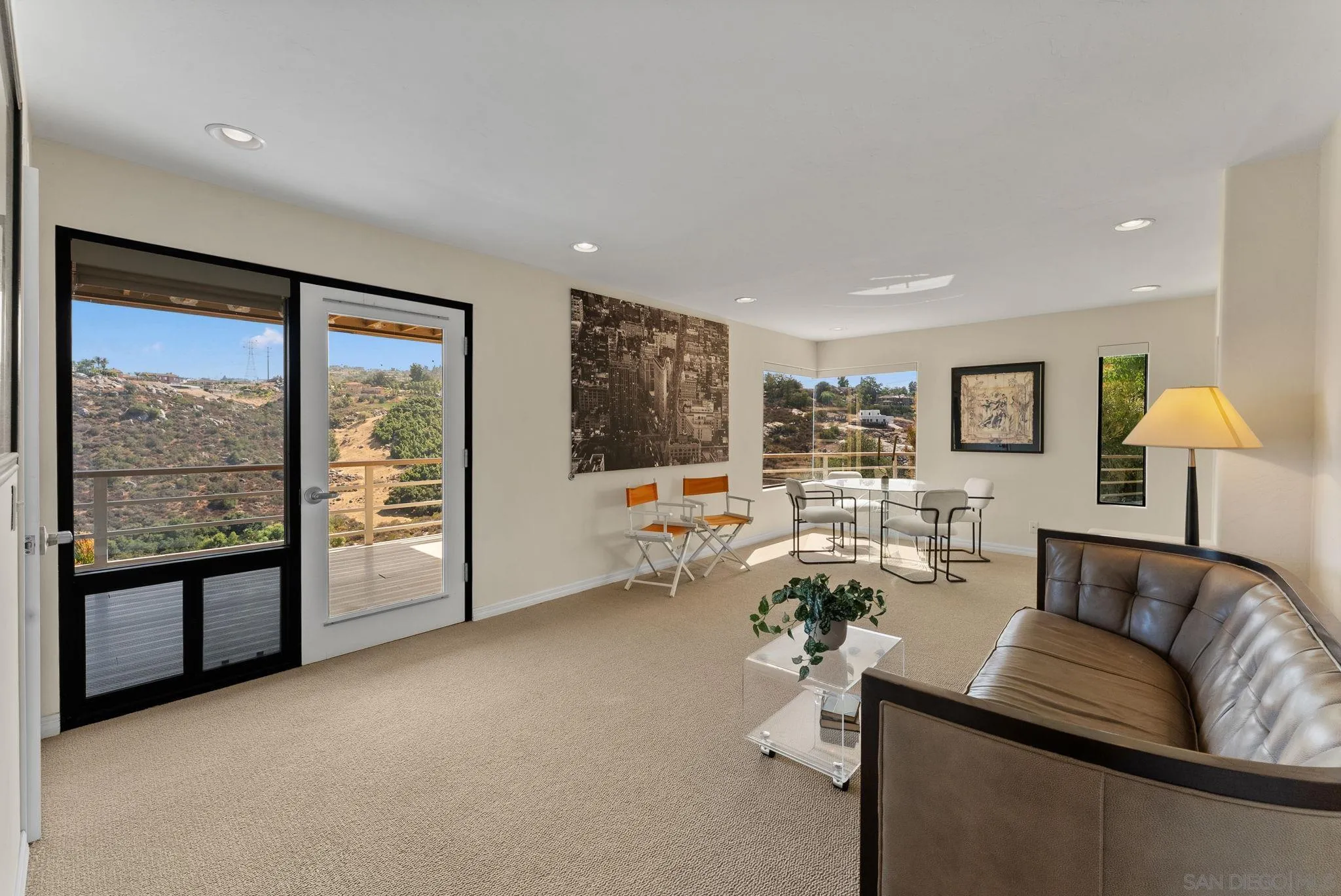 2552 Singing Vista Way El Cajon, CA 92019 - Photo 21 of 34 a living room with furniture and a large window