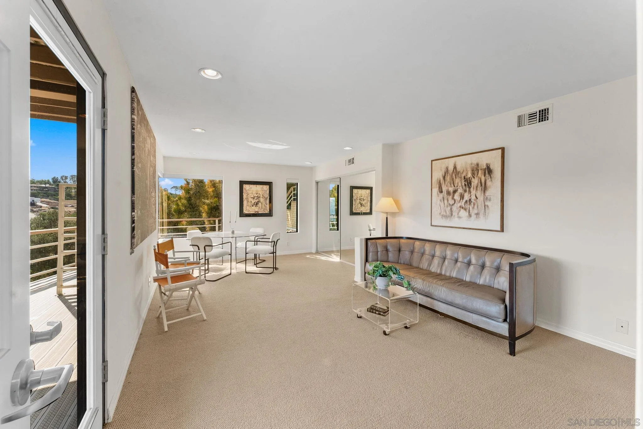 2552 Singing Vista Way El Cajon, CA 92019 - Photo 22 of 34 a living room with furniture and a table