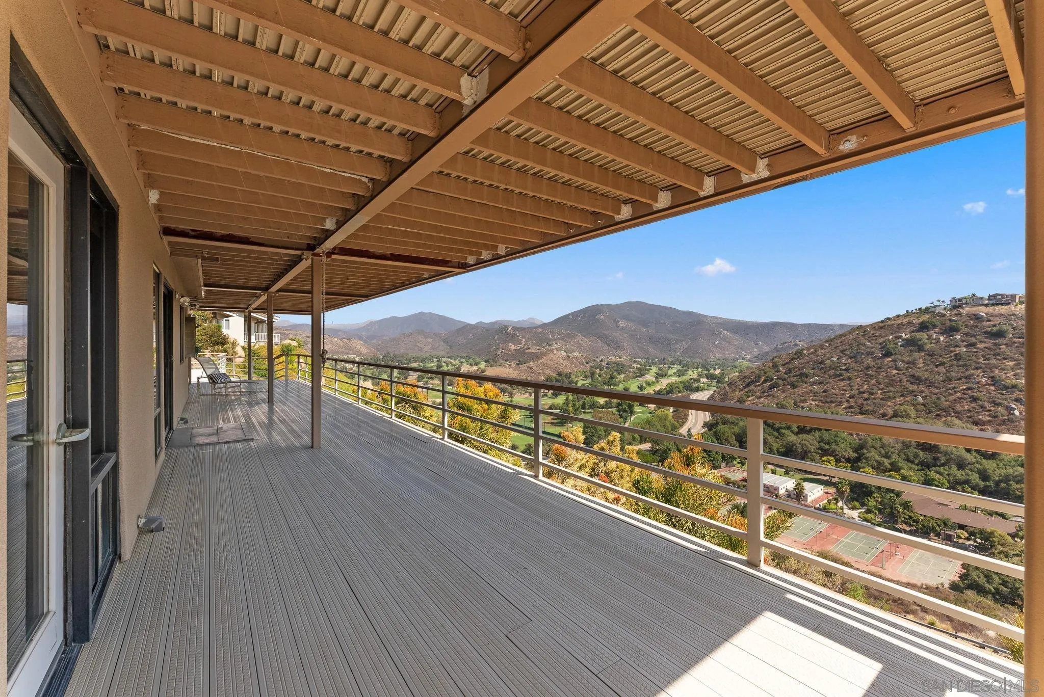 2552 Singing Vista Way El Cajon, CA 92019 - Photo 23 of 34 a view of a balcony with an outdoor seating