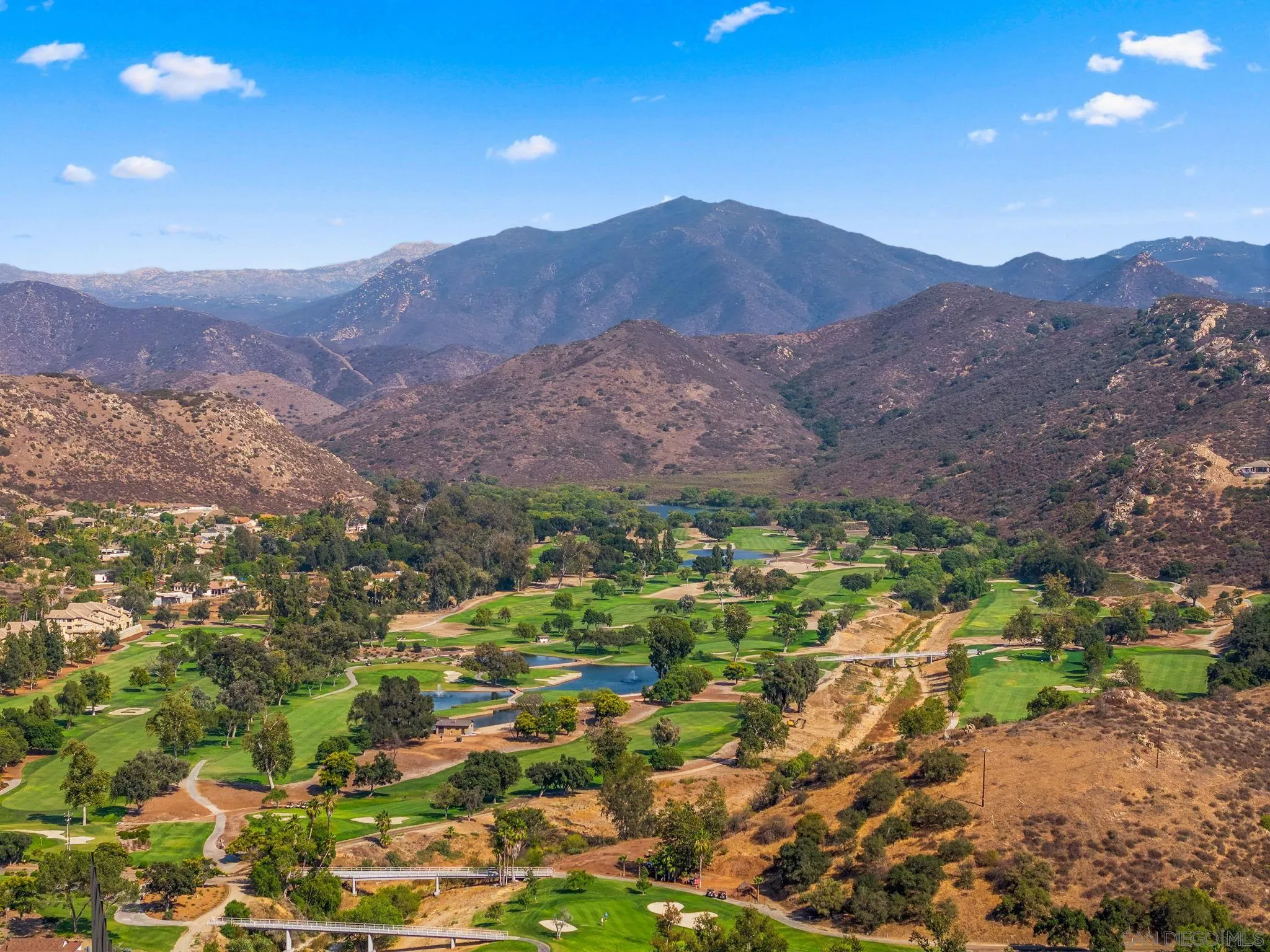 2552 Singing Vista Way El Cajon, CA 92019 - Photo 30 of 34 a view of a lush green hillside and houses