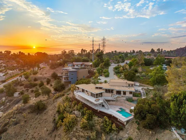 a front view of a house with swimming pool