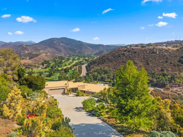a view of a city with mountains in the background