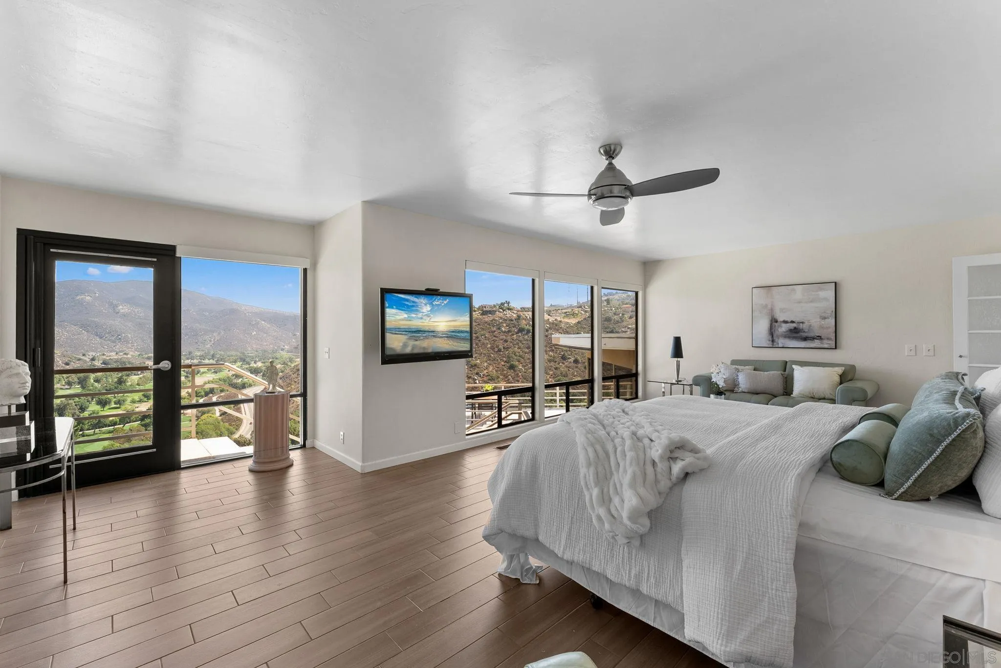 2552 Singing Vista Way El Cajon, CA 92019 - Photo 9 of 34 a living room with furniture a large window with outer view
