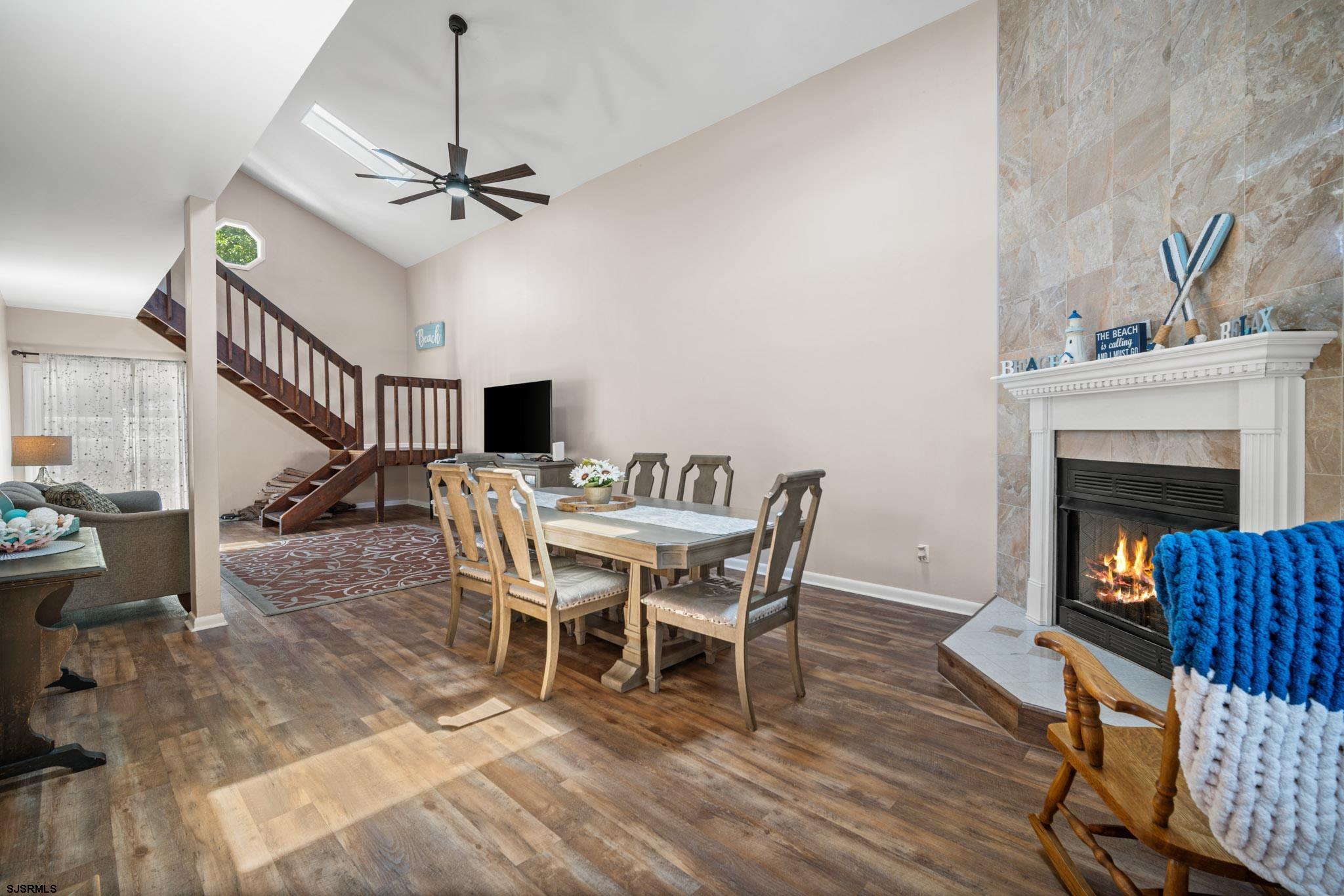 10 Explorer Road Brigantine, NJ 08203 - Photo 13 of 39 a dining room with furniture entryway and wooden floor