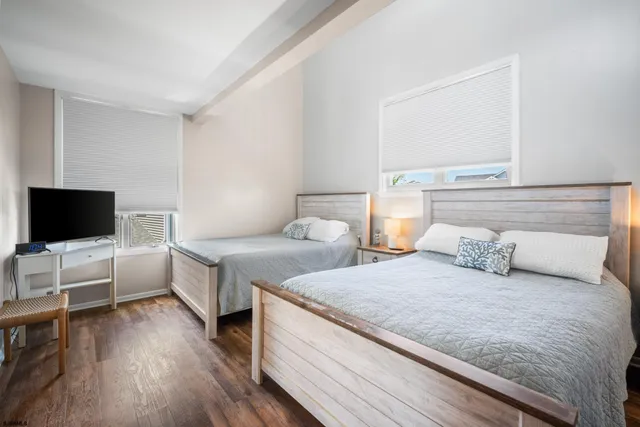 a bathroom with a granite countertop sink a vanity and a mirror