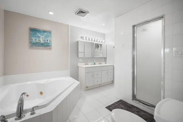 a living room with furniture wooden floor and a fireplace