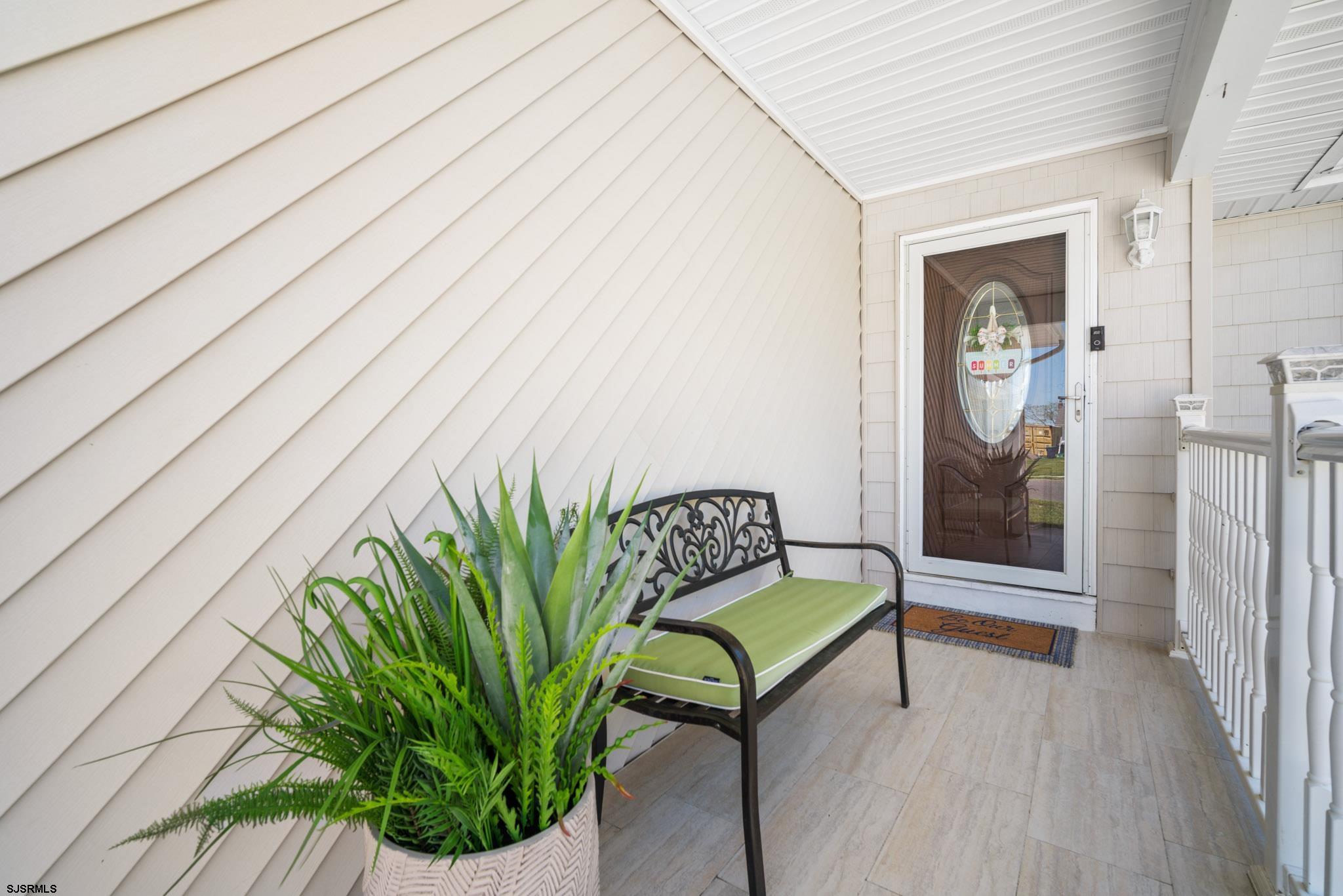 10 Explorer Road Brigantine, NJ 08203 - Photo 2 of 39 a view of a two chair in the balcony