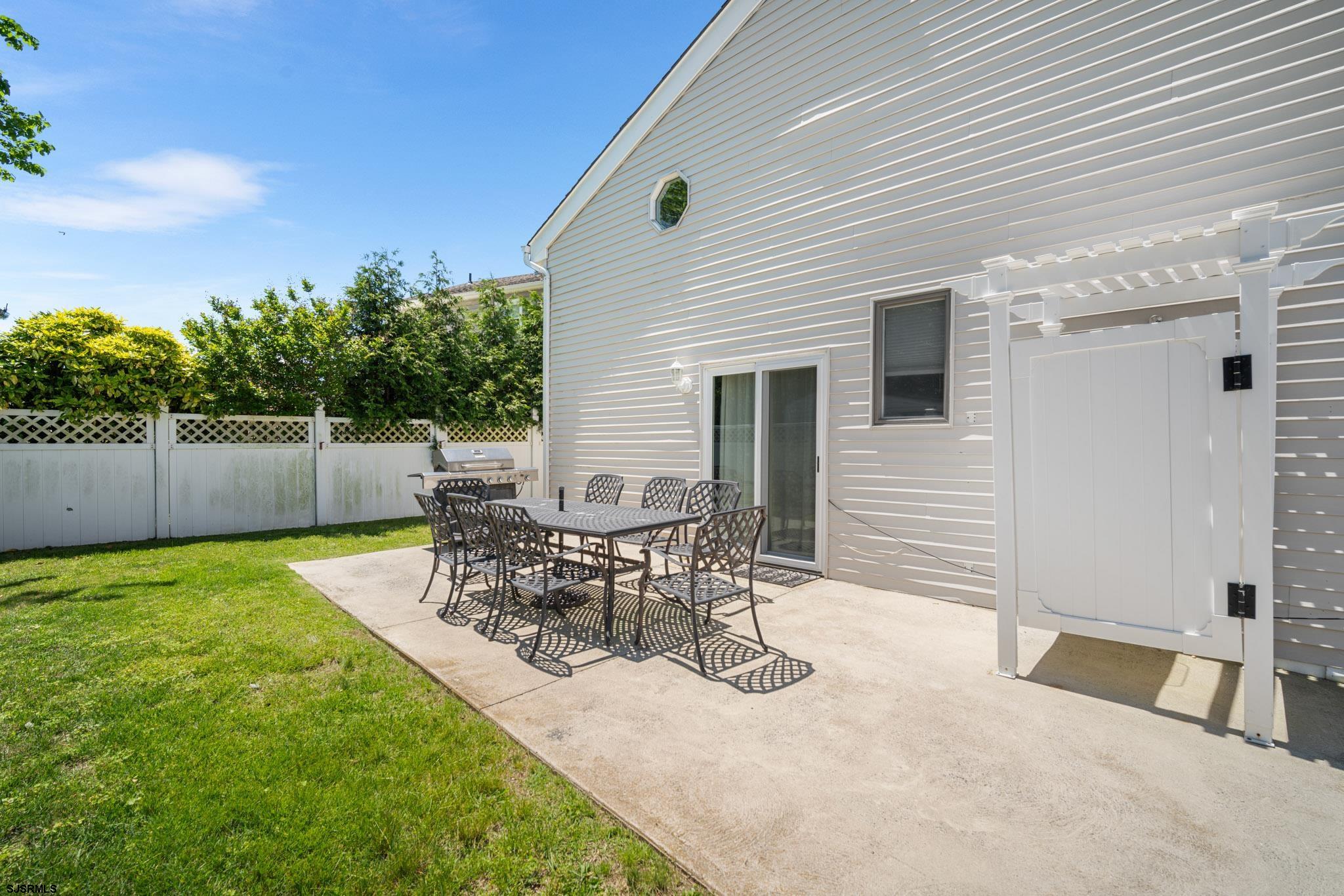 10 Explorer Road Brigantine, NJ 08203 - Photo 34 of 39 a view of a backyard with sitting area