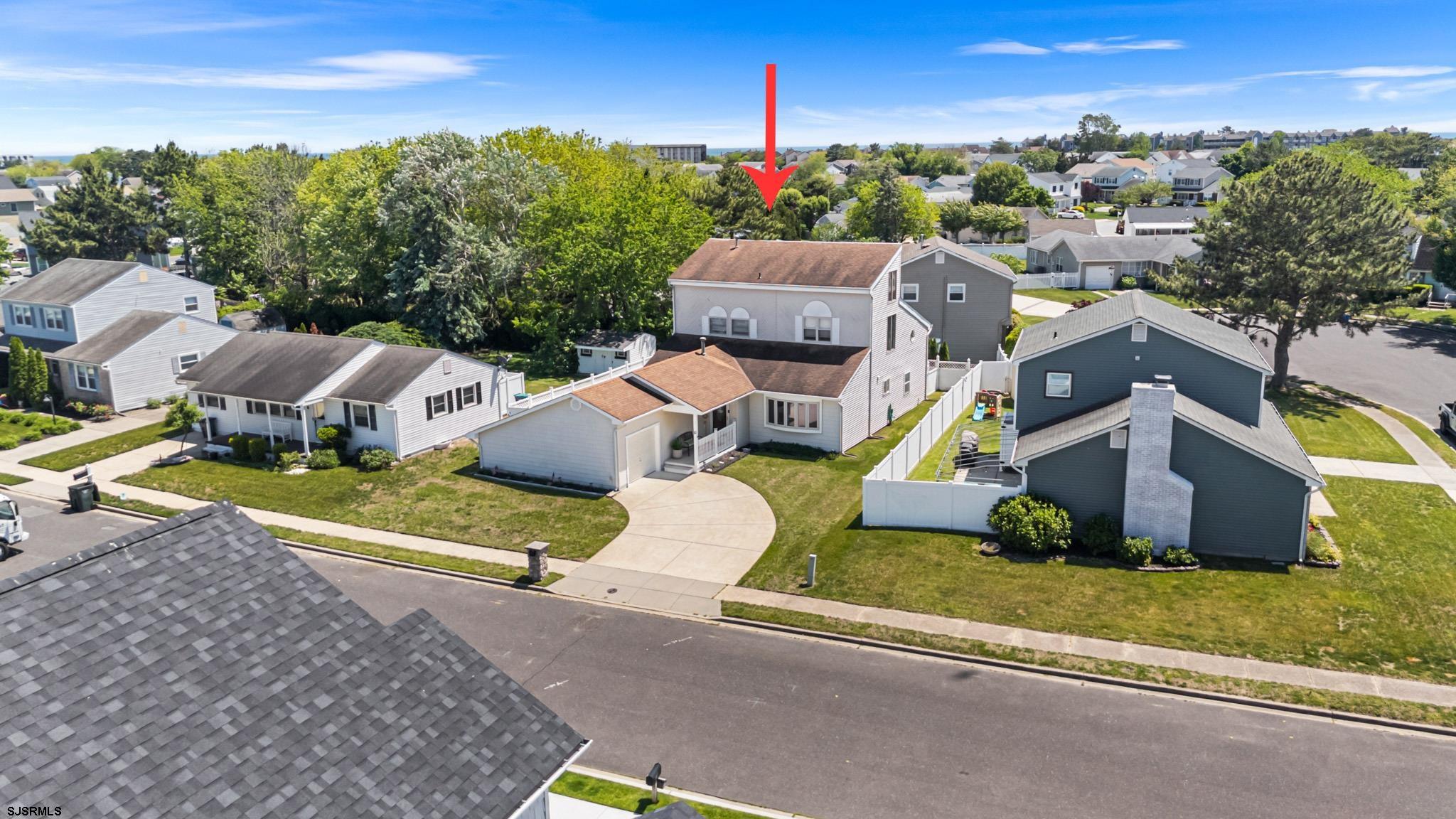 10 Explorer Road Brigantine, NJ 08203 - Photo 39 of 39 an aerial view of a house with a garden and lake view