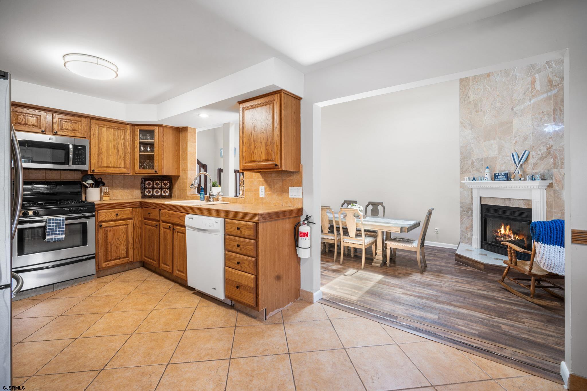 10 Explorer Road Brigantine, NJ 08203 - Photo 7 of 39 a kitchen with a sink appliances cabinets and furniture
