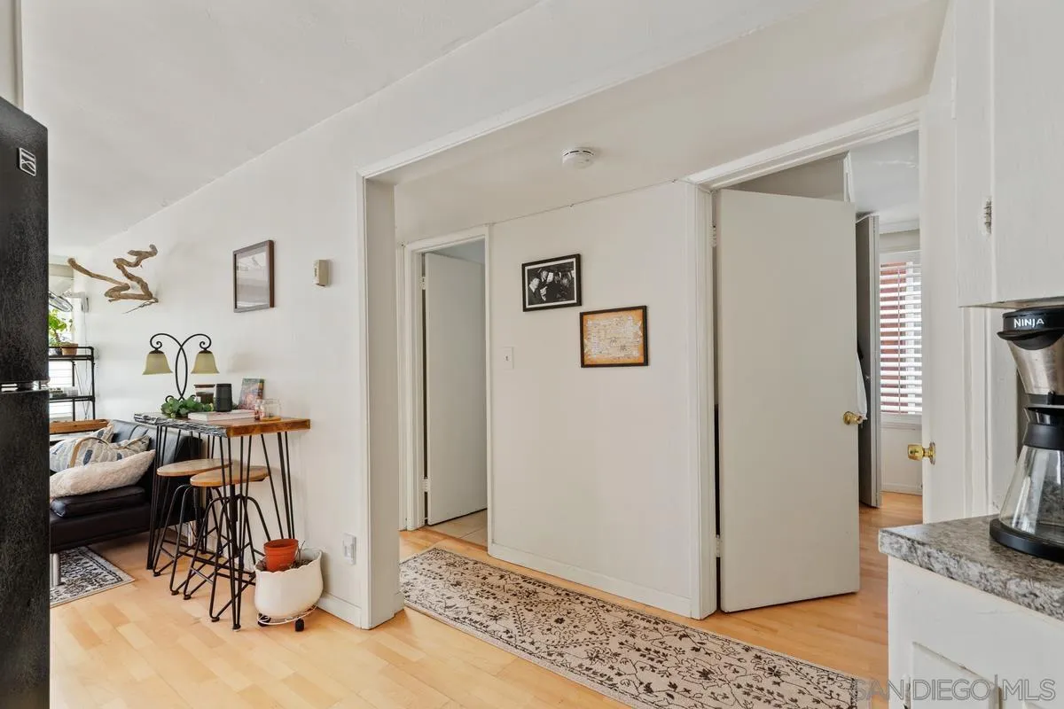 8040 Girard Avenue, Unit 2 La Jolla, CA 92037 - Photo 10 of 17 a view of a livingroom with furniture and gym equipment
