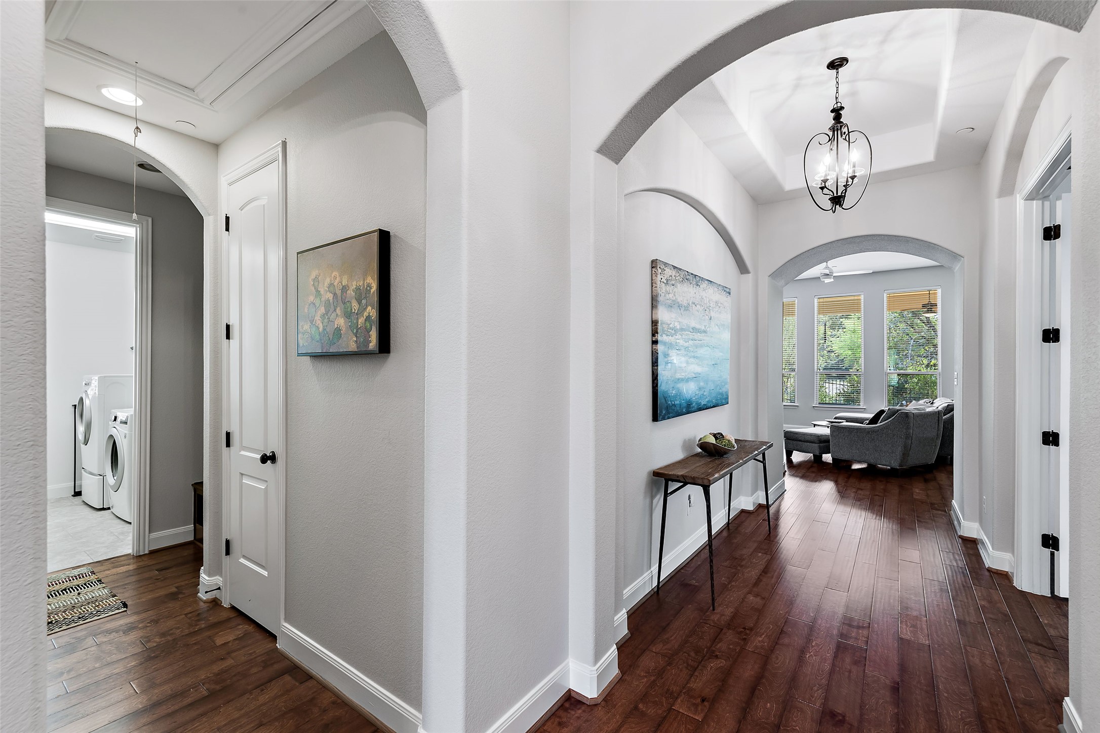 106 Maxwell Way Austin, TX 78738 - Photo 3 of 40 Beautiful arched walkways throughout the entry hallway