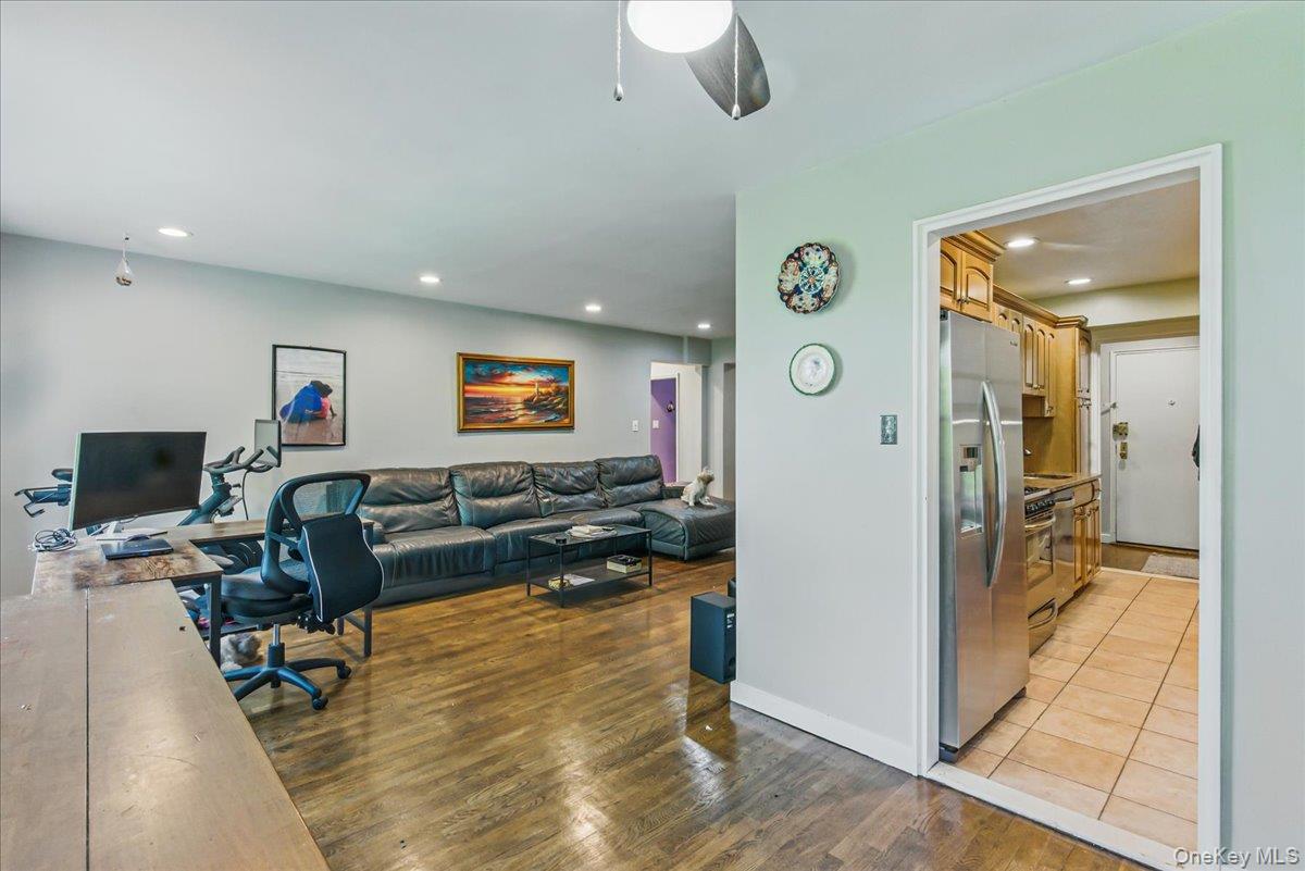 209-80 18th Avenue, Unit 4D Queens, NY 11360 - Photo 7 of 18 Office space featuring light wood-type flooring, recessed lighting, and ceiling fan