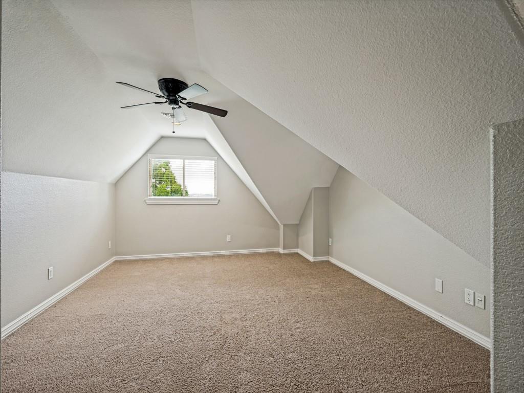 5975 Diamond Spur Frisco, TX 75036 - Photo 29 of 40 an empty room with a window and a ceiling fan